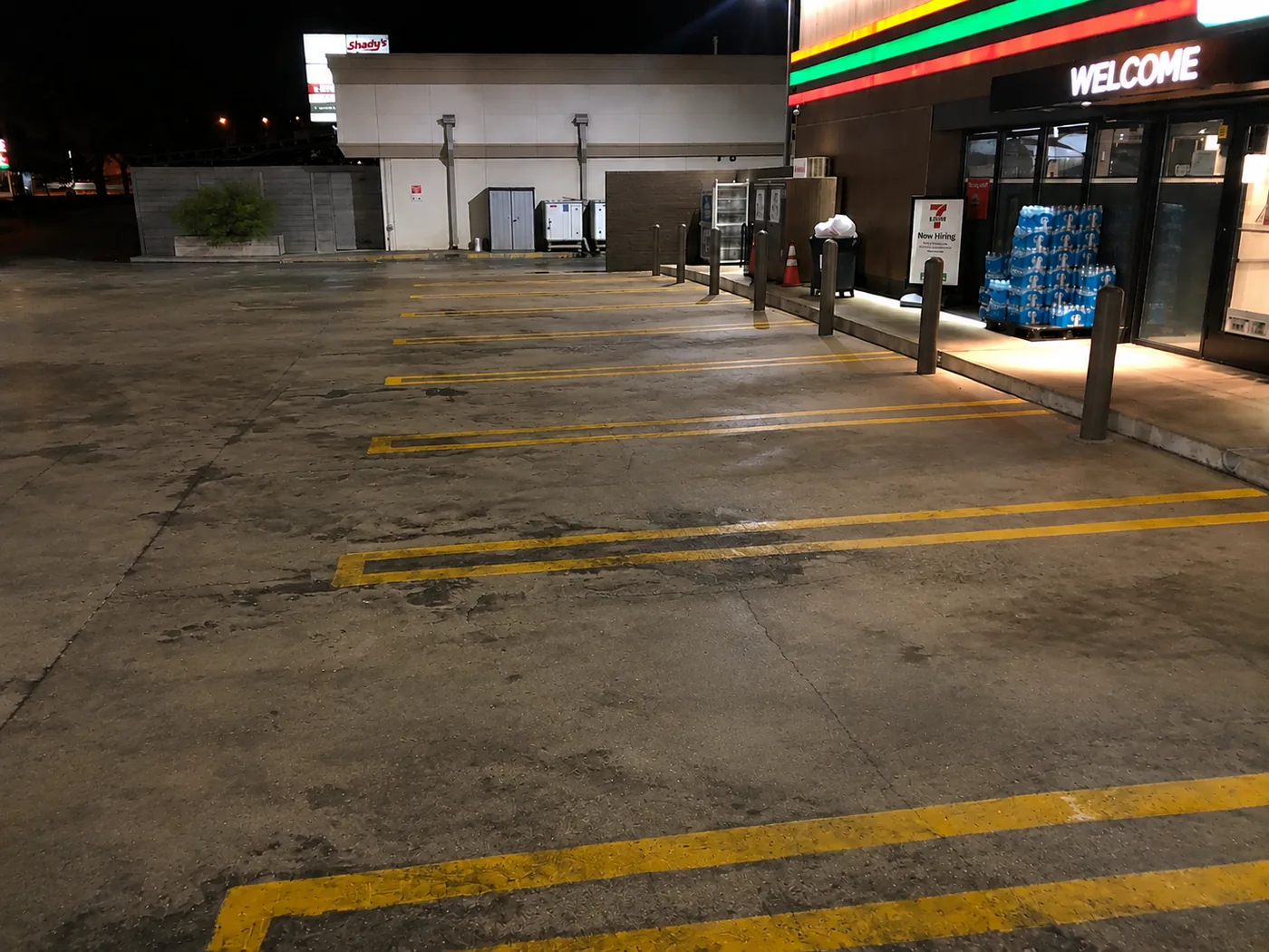 Storefront parking lot before pressure washing